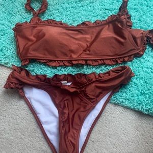 Deep orange ruffled bathing suit bottom & top